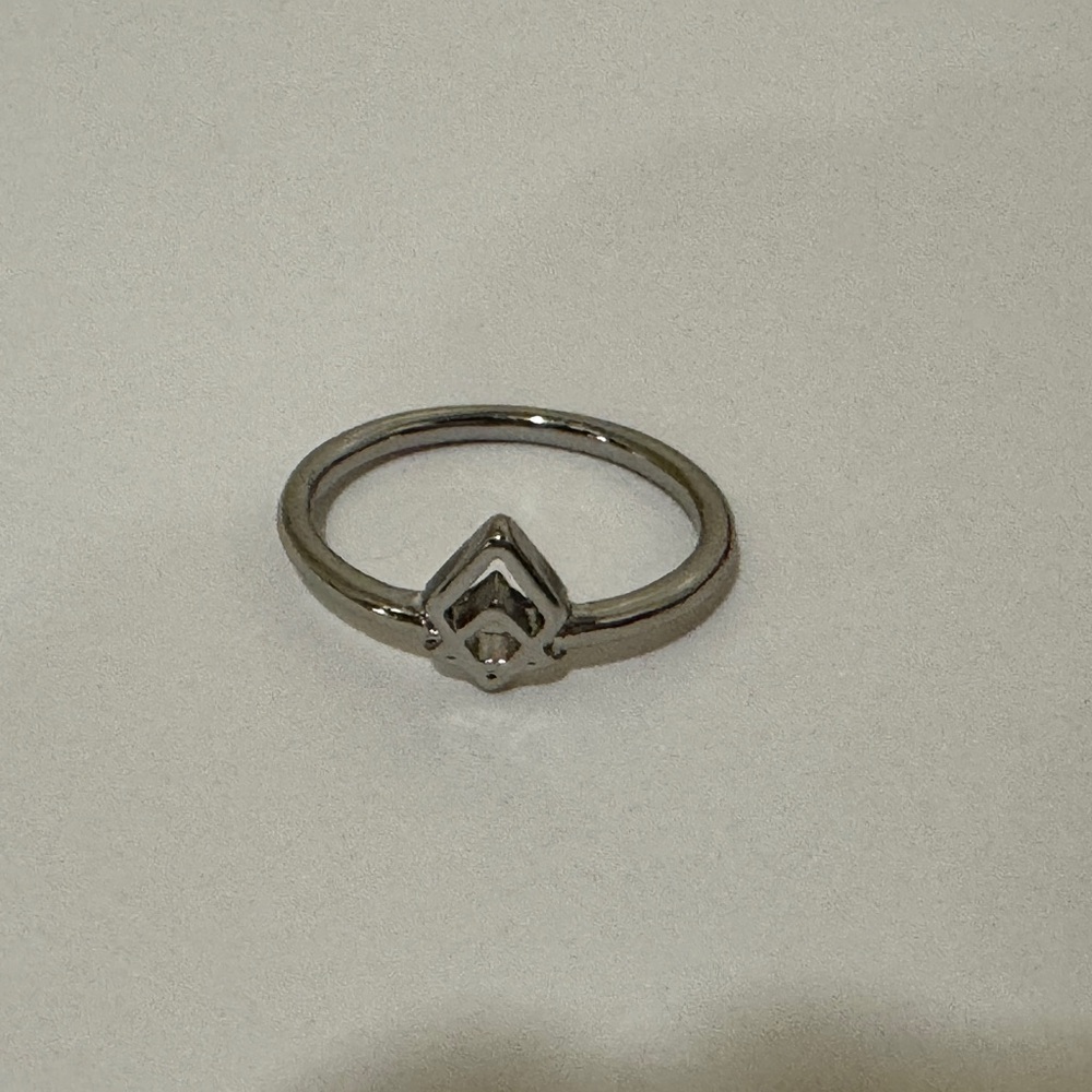 Silver toned diamond shaped ring​​​​​